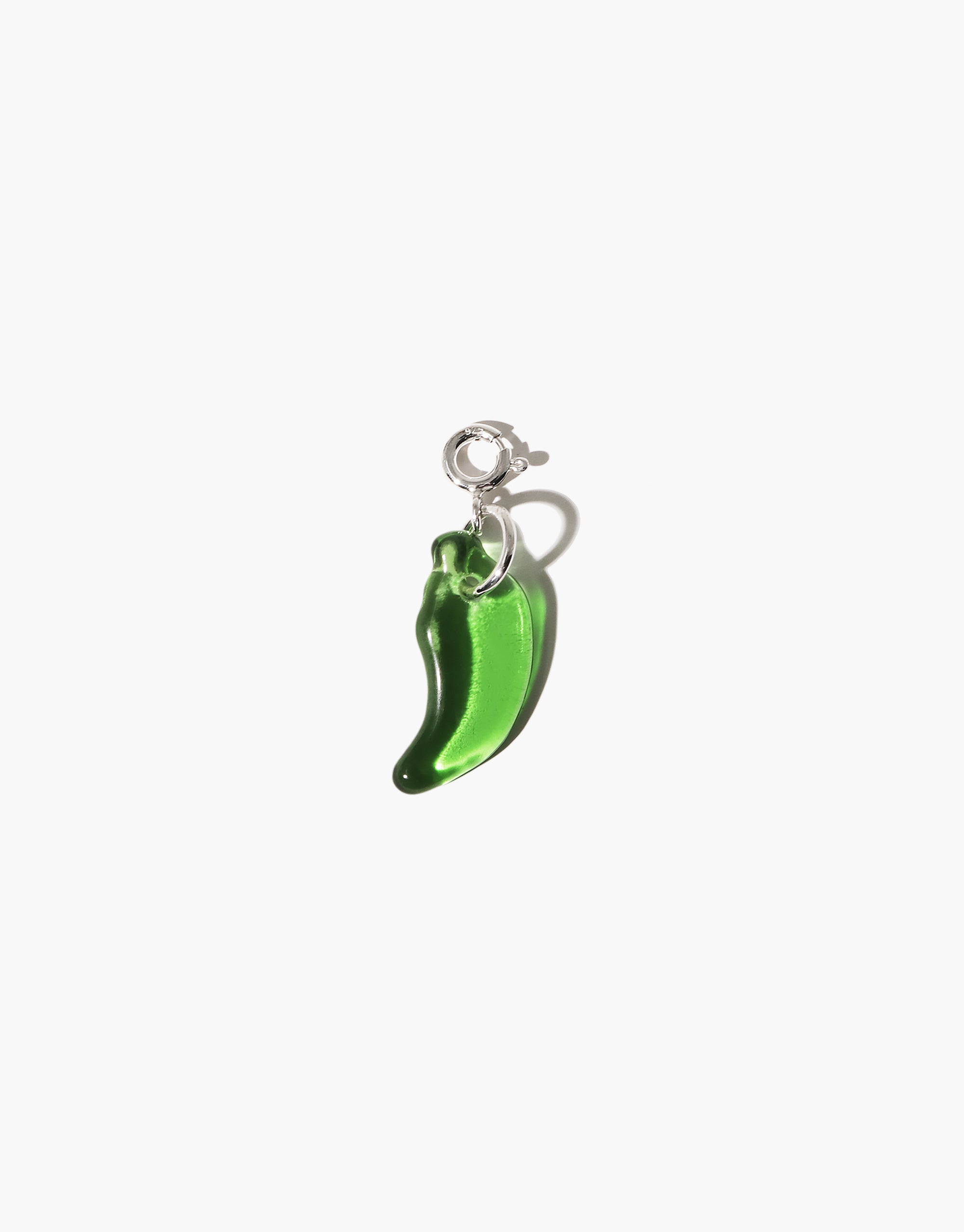 Playful green glass pepper-shaped charm with silver clasp, ideal for adding a spicy accent to jewelry. Pepper | Icon Charm by CLED