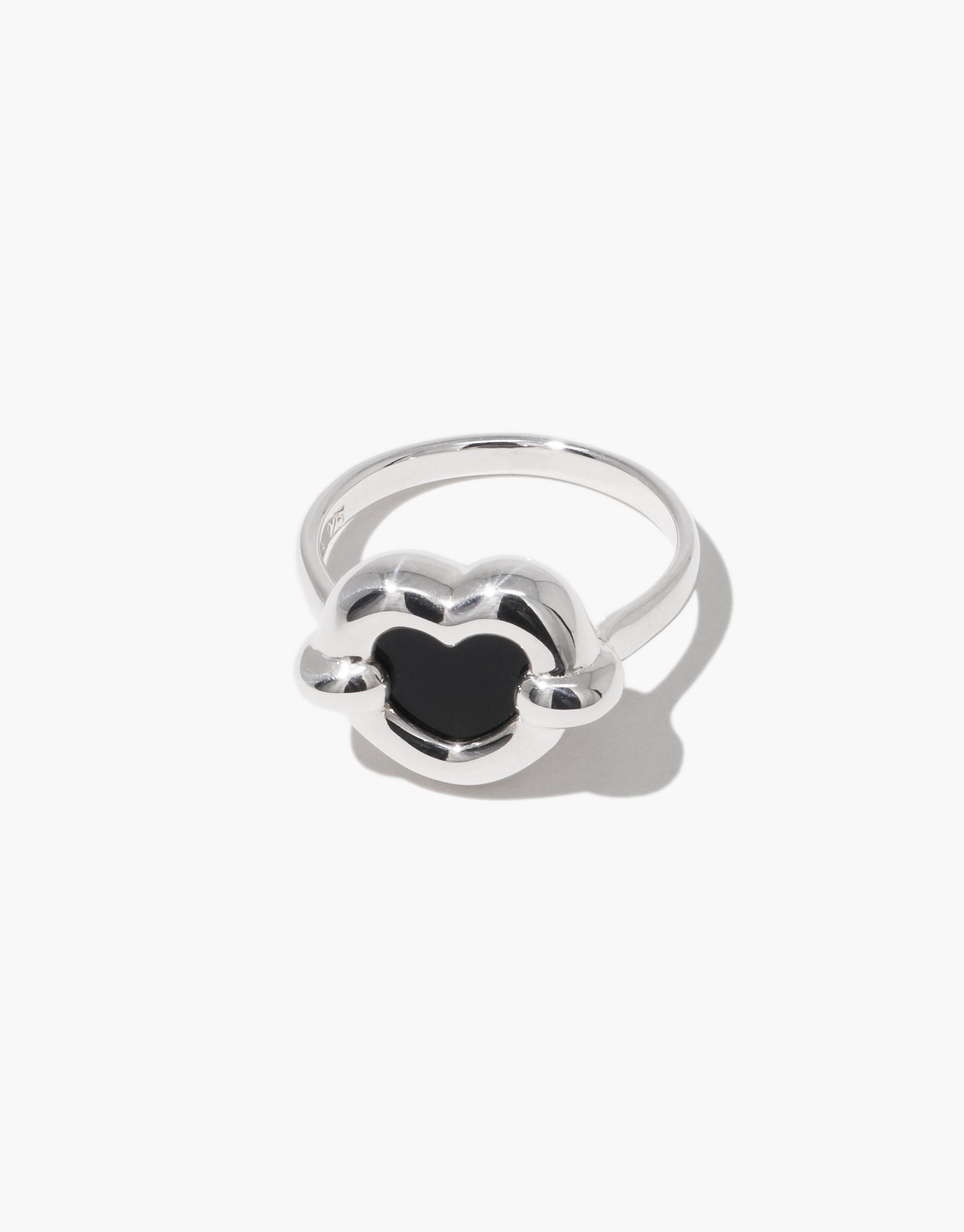 Core Heart Ring | Small features a silver band with a black stone, offering a sleek, sculptural design that embodies modern minimalism, reflecting CLED's eco-conscious craftsmanship ethos.